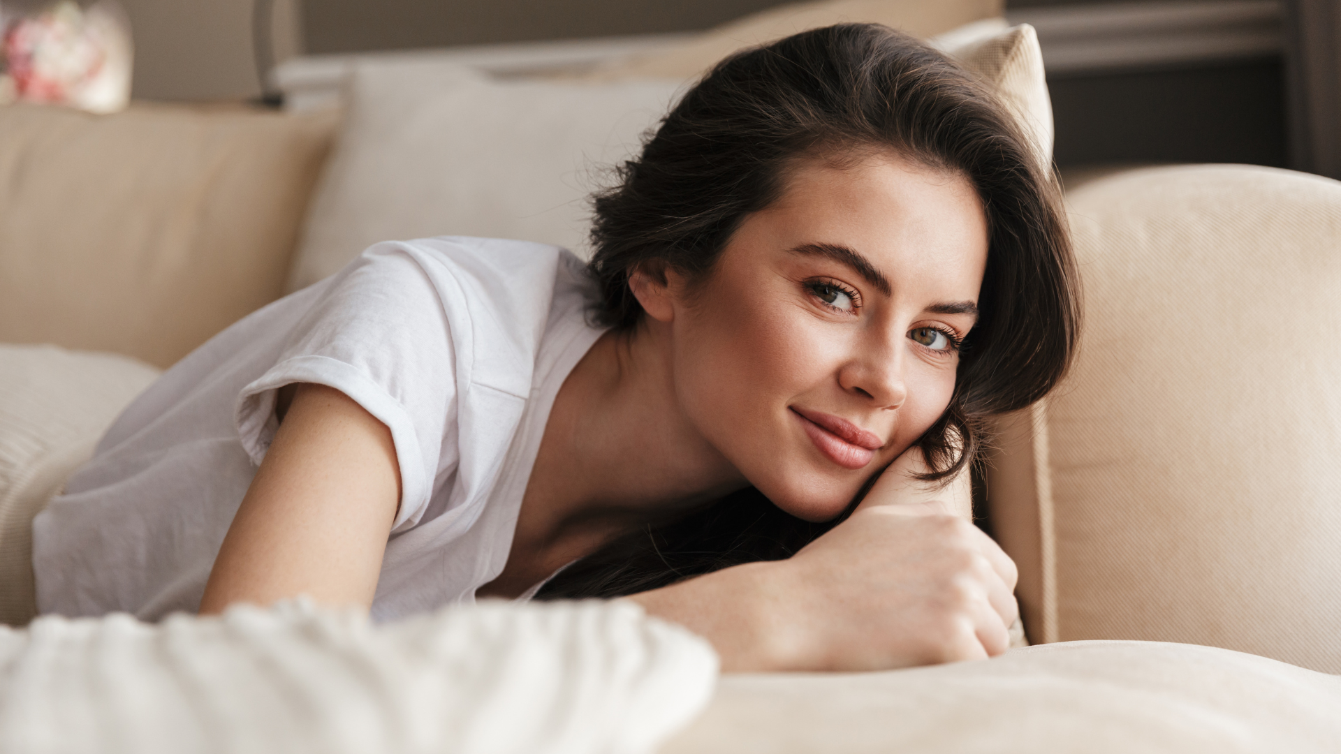 2026-01-25 LBTQ Image 2 A lesbian woman sitting on a bed, reflecting on love, desire